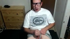 Cute nerdy boy cum to face on webcam