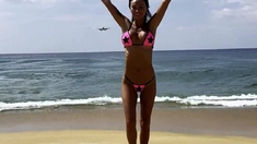 Monika Fox Poses In Pink Bikini With Stars On Beach