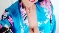 Busty curly brunette with big boobs fucks on couch