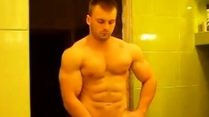 RUSSIAN BODYBUILDER STRIP AND CUM